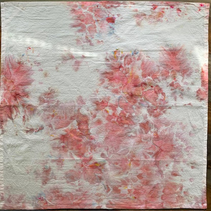Marbled pink tea towel displayed flat
